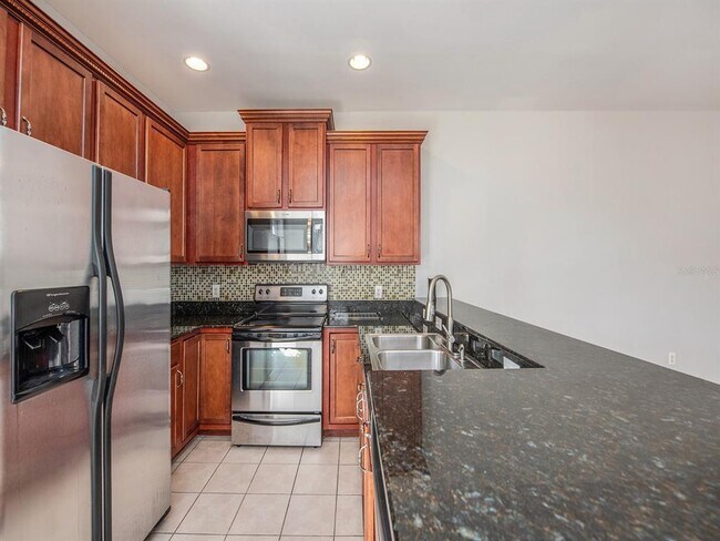 Building Photo - 6810 S Kissimmee St