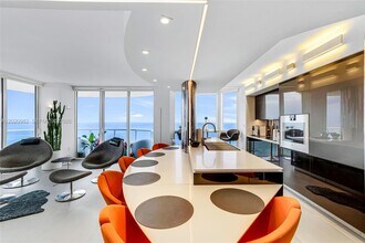 Building Photo - 6365 Collins Ave