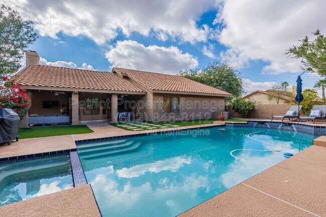 Building Photo - 9910 E Sutton Dr