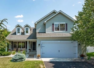 Building Photo - 9264 Peony Ln N