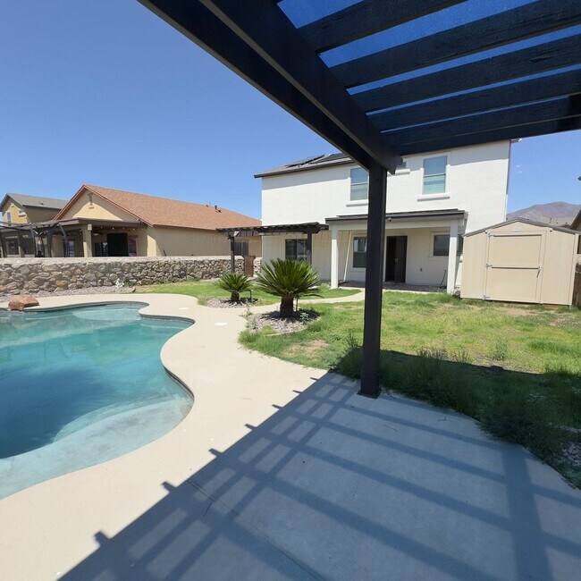 Building Photo - 4 Bedrooms, 3 Baths, a Pool, and Solar Panels!