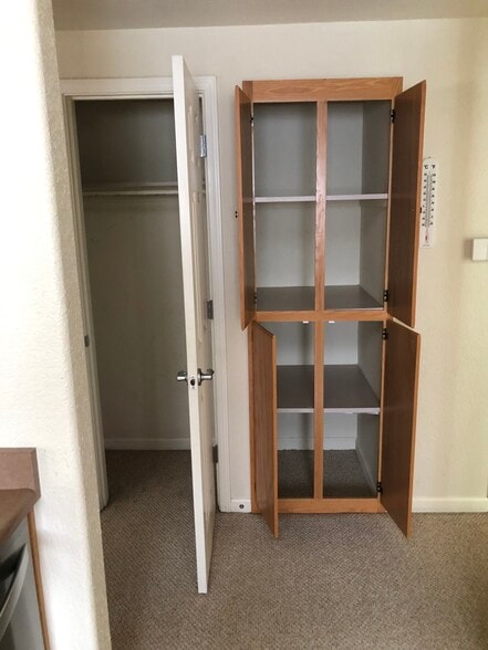 Coat closet and hallway cabinets for extra storage - 10001 Woodcreek Oaks Blvd