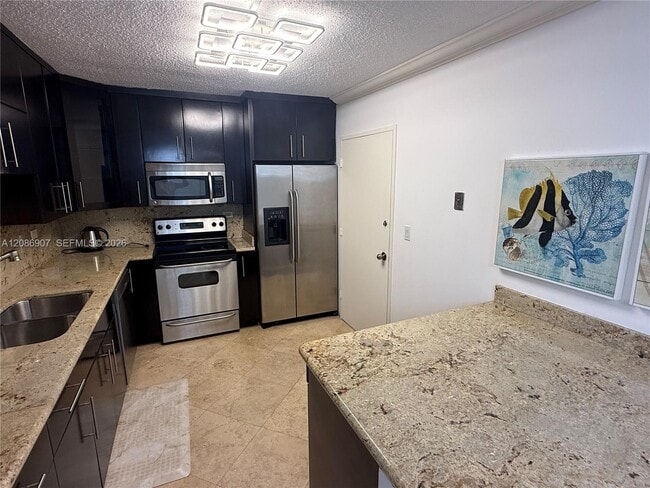 Building Photo - 5555 Collins Ave