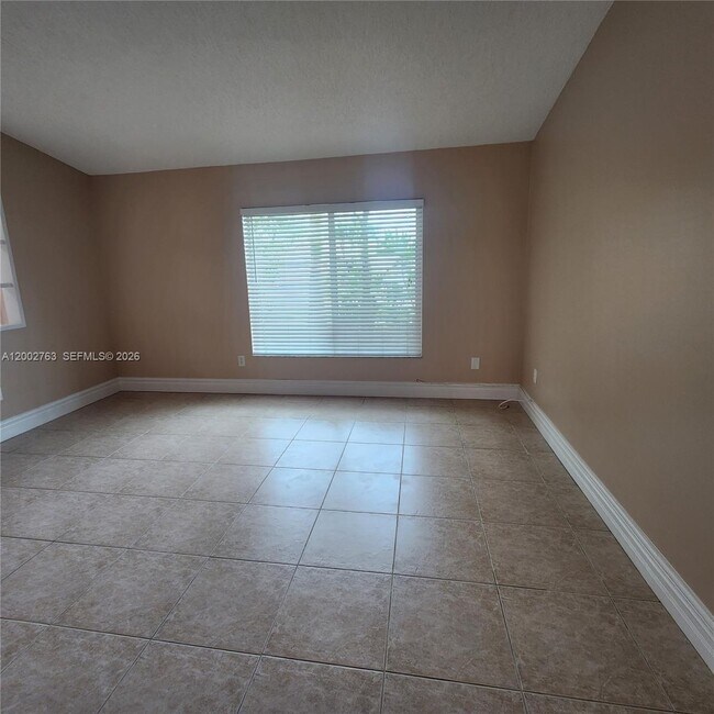 Building Photo - 11950 SW 49th Ct