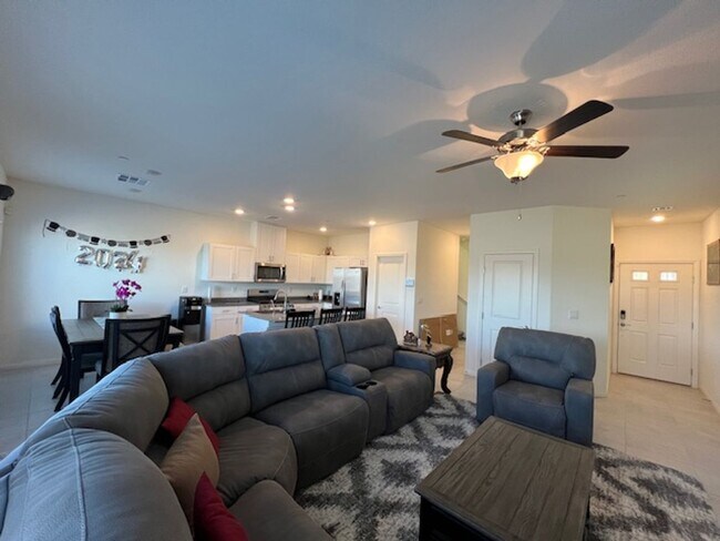 Building Photo - FULLY FURNISHED!!! beautiful 3 bedroom 2 and half bath home is located in the Symmetry Bay Cadenc...