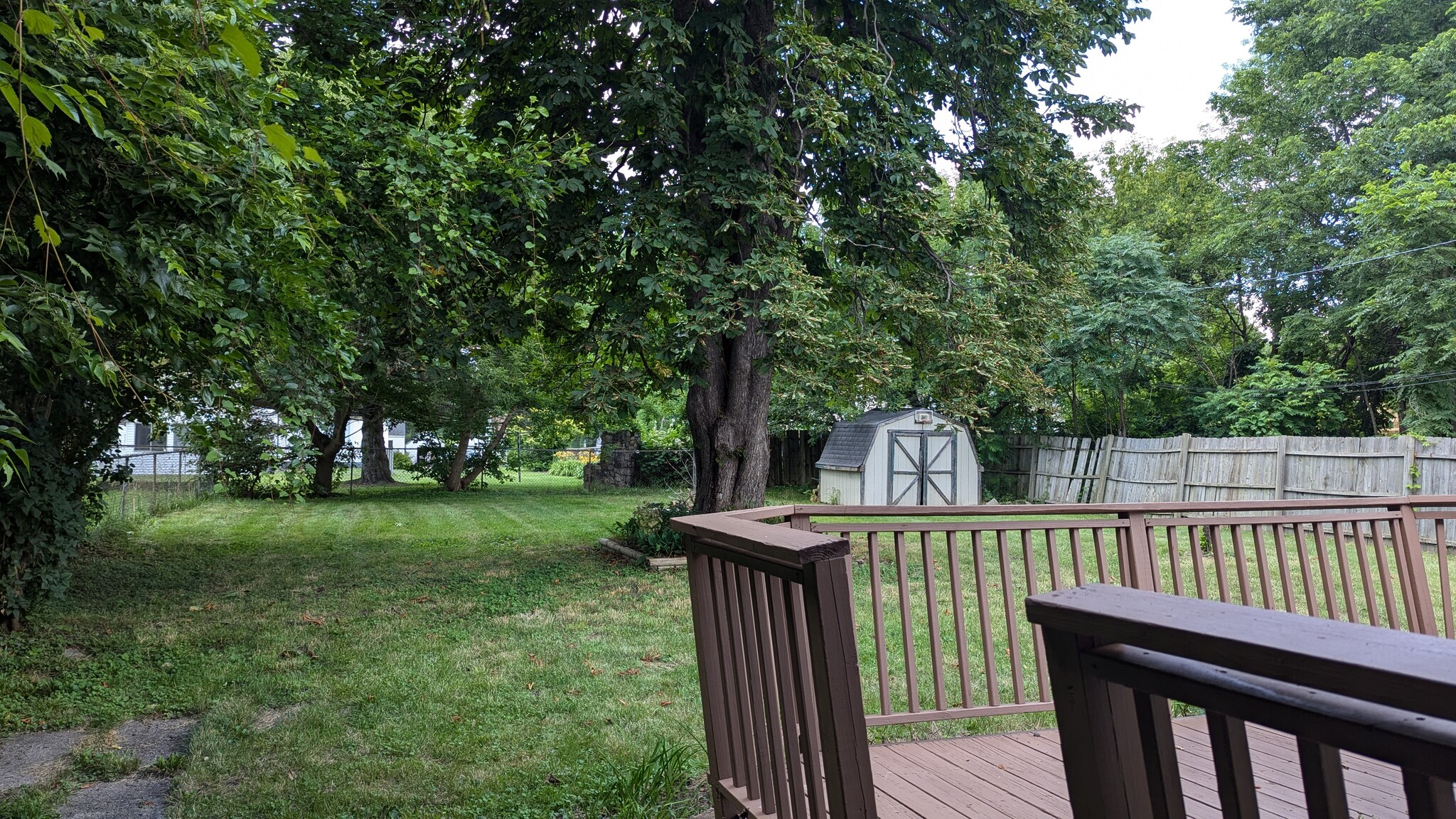 Backyard with Firepit and Shed. - 683 E Beverly Ave