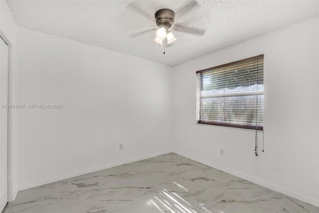 Building Photo - 9728 Hammocks Blvd