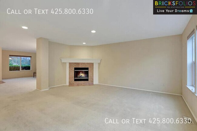 Building Photo - Dream Kitchen, Dual Fireplaces: Find Your Stylish Sanctuary in Redmond Ridge.