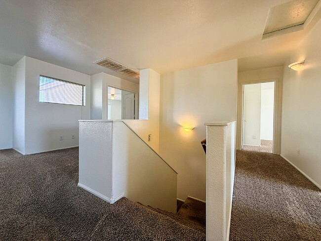 Building Photo - Spacious & Stylish in the Heart of Surprise!