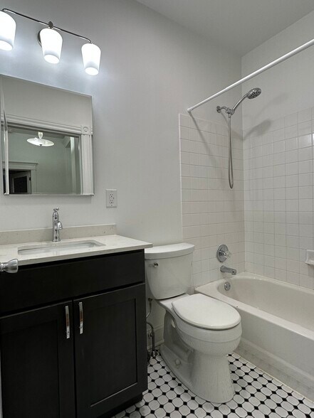 Bathroom with new vanity and new fixtures. - 336 Fitzwater St