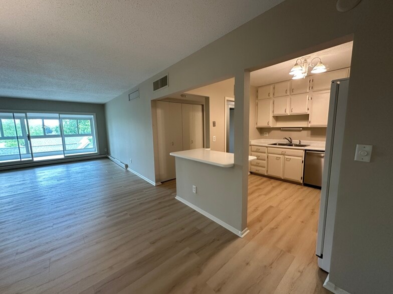 Open floor plan with 3-season enclosed porch - 4075 W 51st St