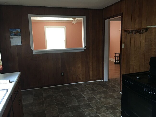 Building Photo - Single Family Home with large fenced back yard