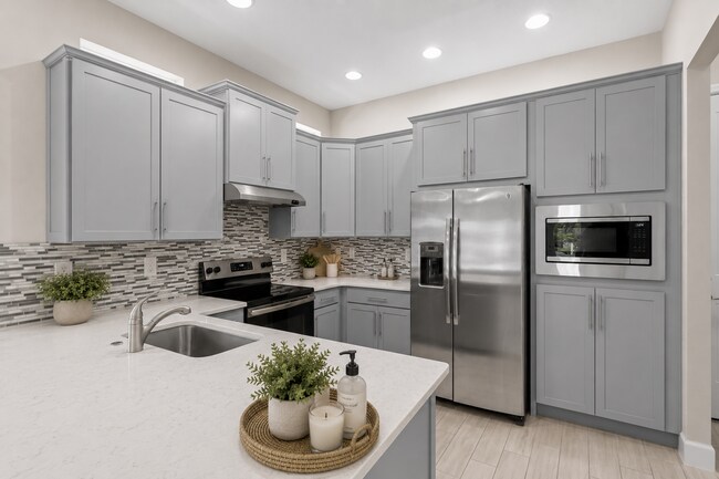 Building Photo - Move In Ready End Unit Townhome in Laureate Park | 3 Bed | Tesla Charger