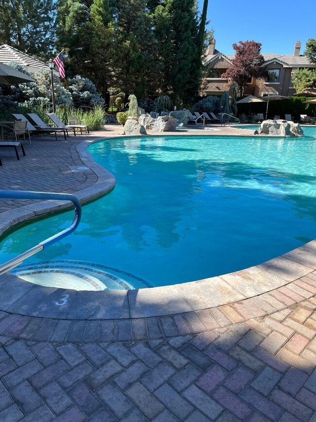 Building Photo - Tanamera Resort Gated Community.  One bedroom, one full bathroom, one car attached garage.