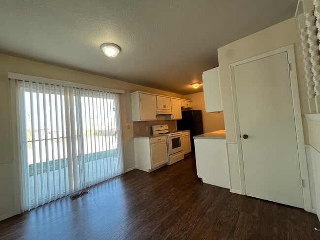 Building Photo - Sheridan Duplexes 01-03