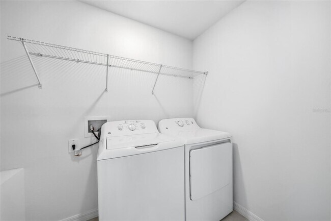 Building Photo - 8879 Coqui Song Ln