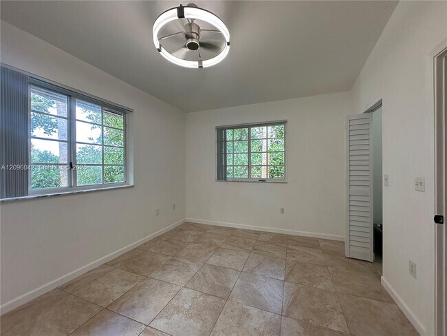 Building Photo - 3241 Sabal Palm Manor