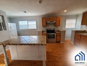 Building Photo - Spacious 4-bedroom 1.5 bath home AVAILABLE SOON!