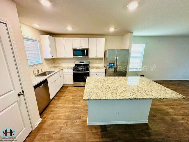 Building Photo - 5022 Jaspillite Ave