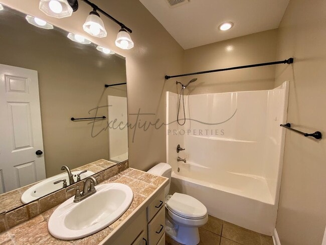 Building Photo - Family Home in Lafitte Landing – Fenced Ya...