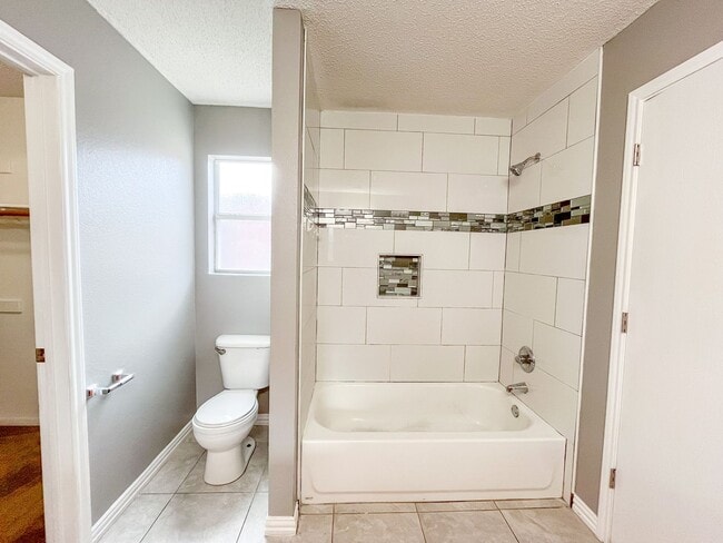 Building Photo - Available NOW!!!! Beautiful 4 bedroom, 2 bath, 2 car garage home with a privacy fenced yard and c...