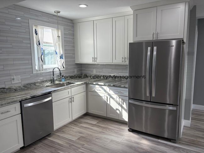 Building Photo - Fully Renovated Condo For Rent in West War...