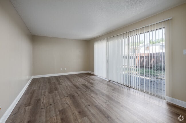 2BR, 1BA - 875SF - Living Room - Peacock Apartments