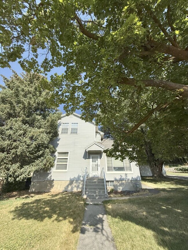 Building Photo - Timeless Charm, Modern Living — 4-Bed Gem ...