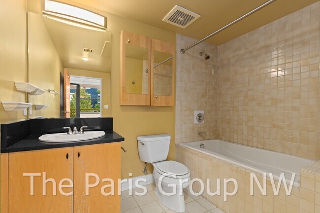 Building Photo - Exceptional 2 Story CapHill Condo * 2 Pkg Spaces, EV Charger & Rooftop Views