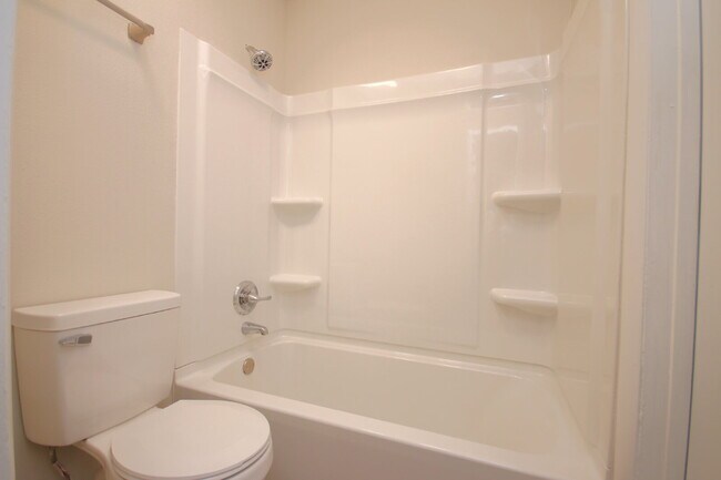 Building Photo - Fully Renovated 3BR/2BA Molino Home on a Spacious Lot Featuring Multiple Living Areas, Sunroom & ...