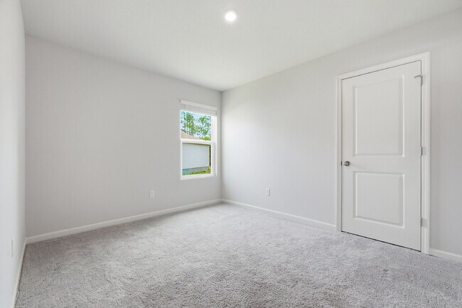 Building Photo - New community! Three bedrooms, two bathrooms and ready for you to move into!