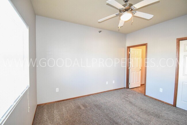 Building Photo - Spring Move-in special; 2 Bedroom 2 Bath Condo on the Ground level with detached garage!