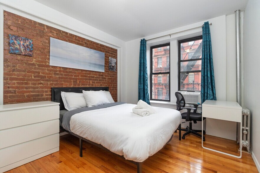 Building Photo - 309-311-311 E 95th St