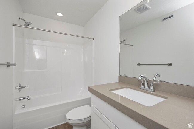 Building Photo - 3-bedroom, 2.5-bath townhome offering modern living in an unbeatable location.