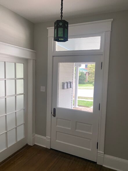 Foyer at front of home to porch - 306 N Main St
