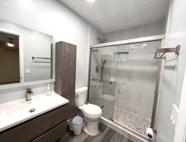 Building Photo - Two-story condominium, featuring 2 bedrooms and 2 1/2 bathrooms