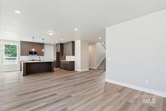 Building Photo - Brand New Spacious 4-Bedroom Home with 3-Car Garage, Granite Kitchen & Prime Middleton Location