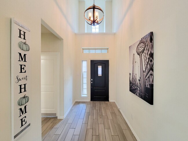 Building Photo - This thoughtfully designed home boasts 4 spacious bedrooms (2 down) and 3.5 baths, providing ampl...