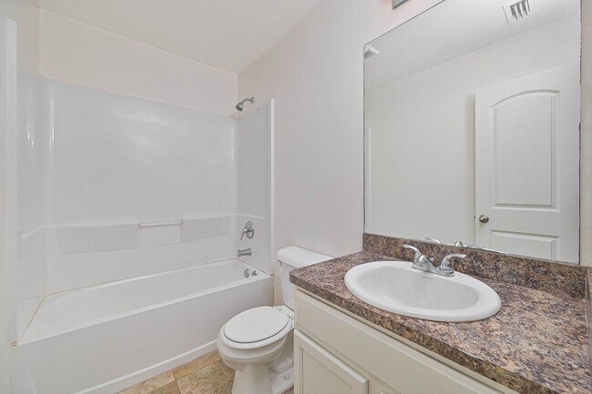 Building Photo - 3BR/2.5BA Cape Coral Home w/ 2-Car Garage & Spacious Yard – Available Now!