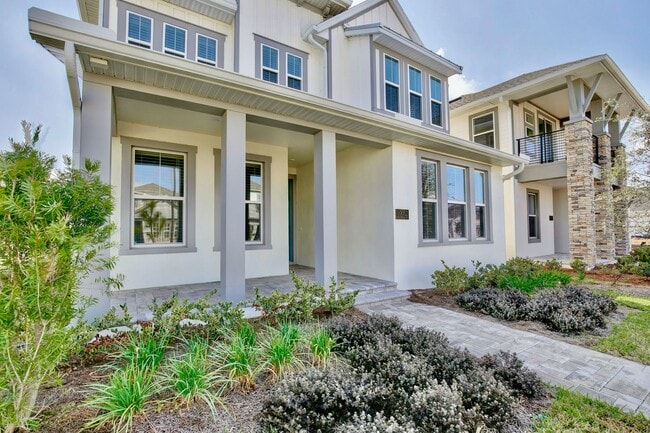 Building Photo - Gorgeous 4/3 Residence with a Private Back Lanai and a 2 Car Garage in the Delightful Laureate Pa...