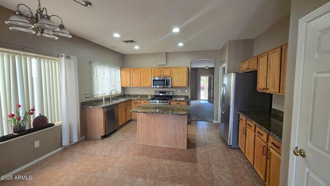 Building Photo - 4216 N 125th Ave