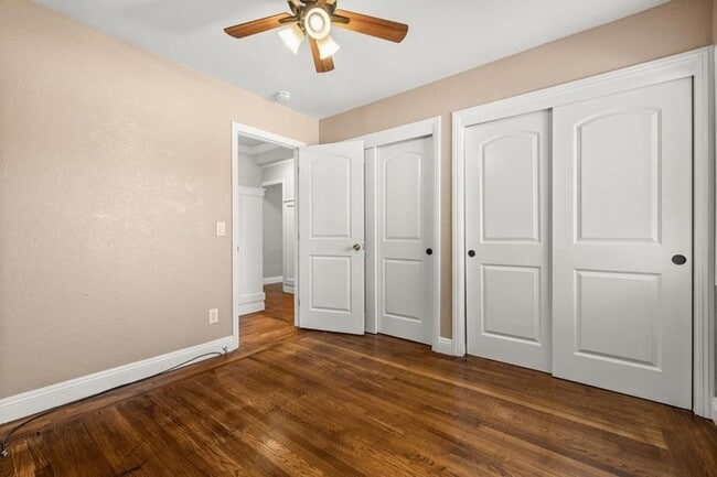 Building Photo - Welcome to this stunning 4-bedroom, 2-bath...