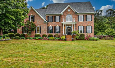 Building Photo - Spacious & Striking 3-story brick Executiv...