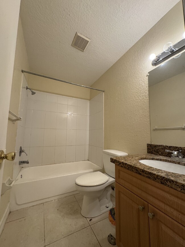 Building Photo - "Charming 1-Bedroom Condo Retreat with Stu...