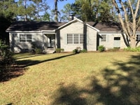 Building Photo - Spacious 3-Bedroom Brick Home with Firepla...