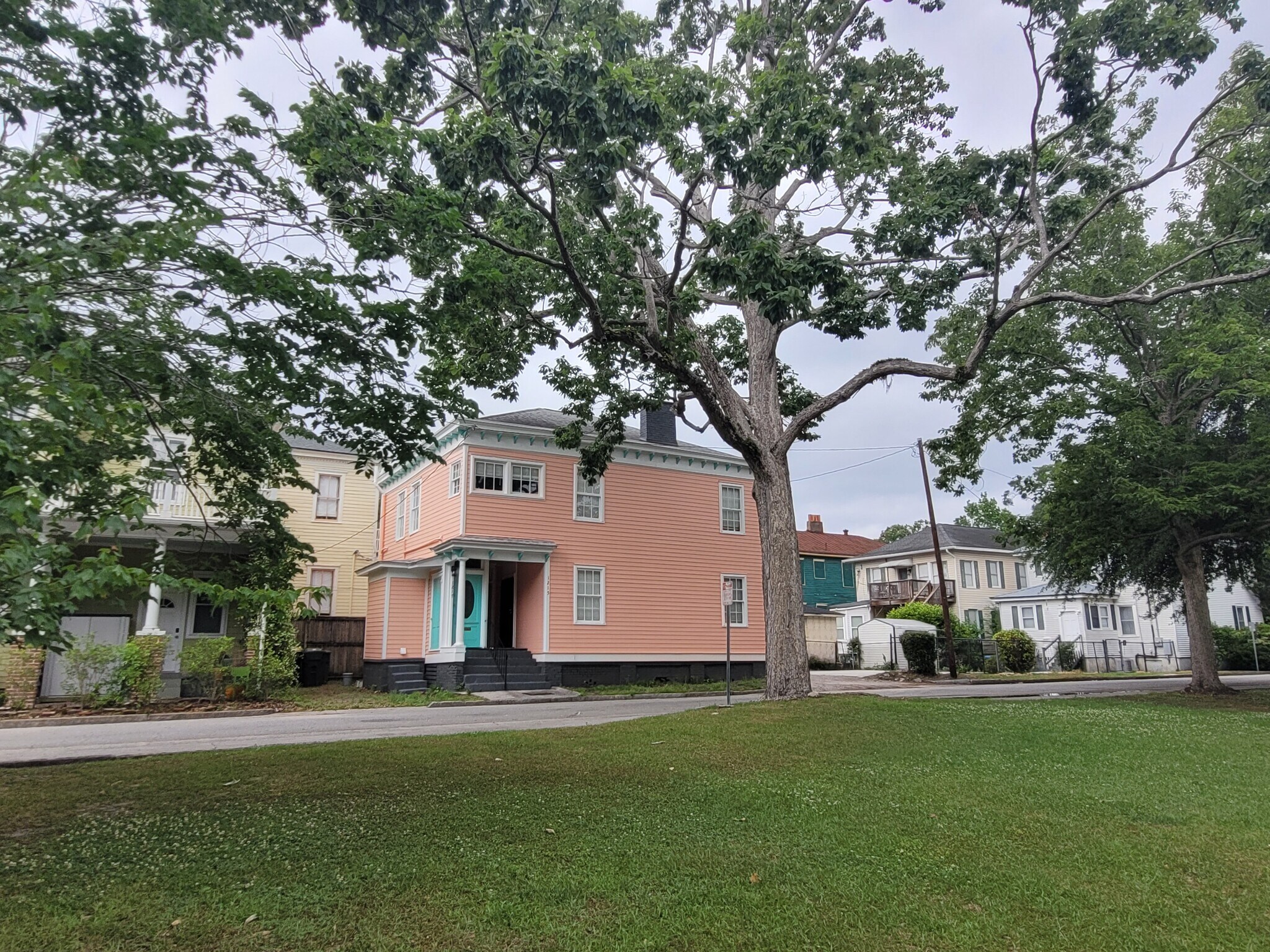 Java Place Duplex from Dixon Park. Lane to the right, parking spot/patio to the left. - 1215 Java Pl