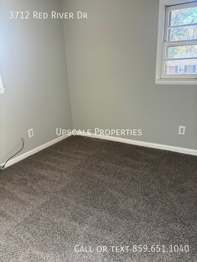 Building Photo - 3712 Red River Dr