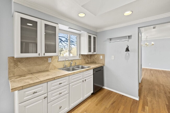 Building Photo - Spacious Split-Level Home with Beautiful Kitchen, Large Deck, and Fully Fenced Yard