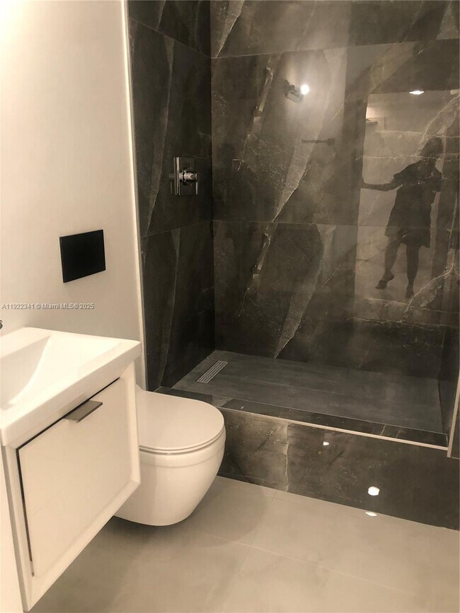 Building Photo - 10185 Collins Ave