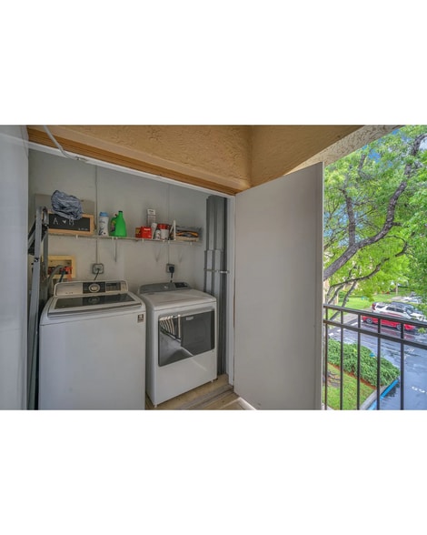 Washer/dryer on balcony - 11650 SW 2nd St